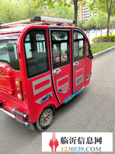 電動三輪車。