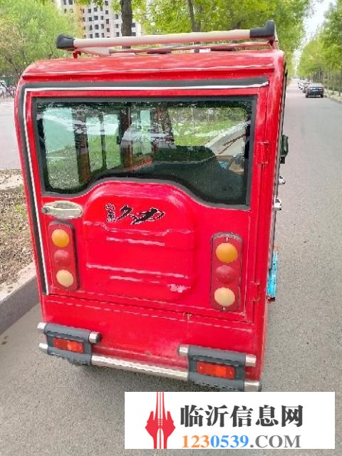 電動三輪車。